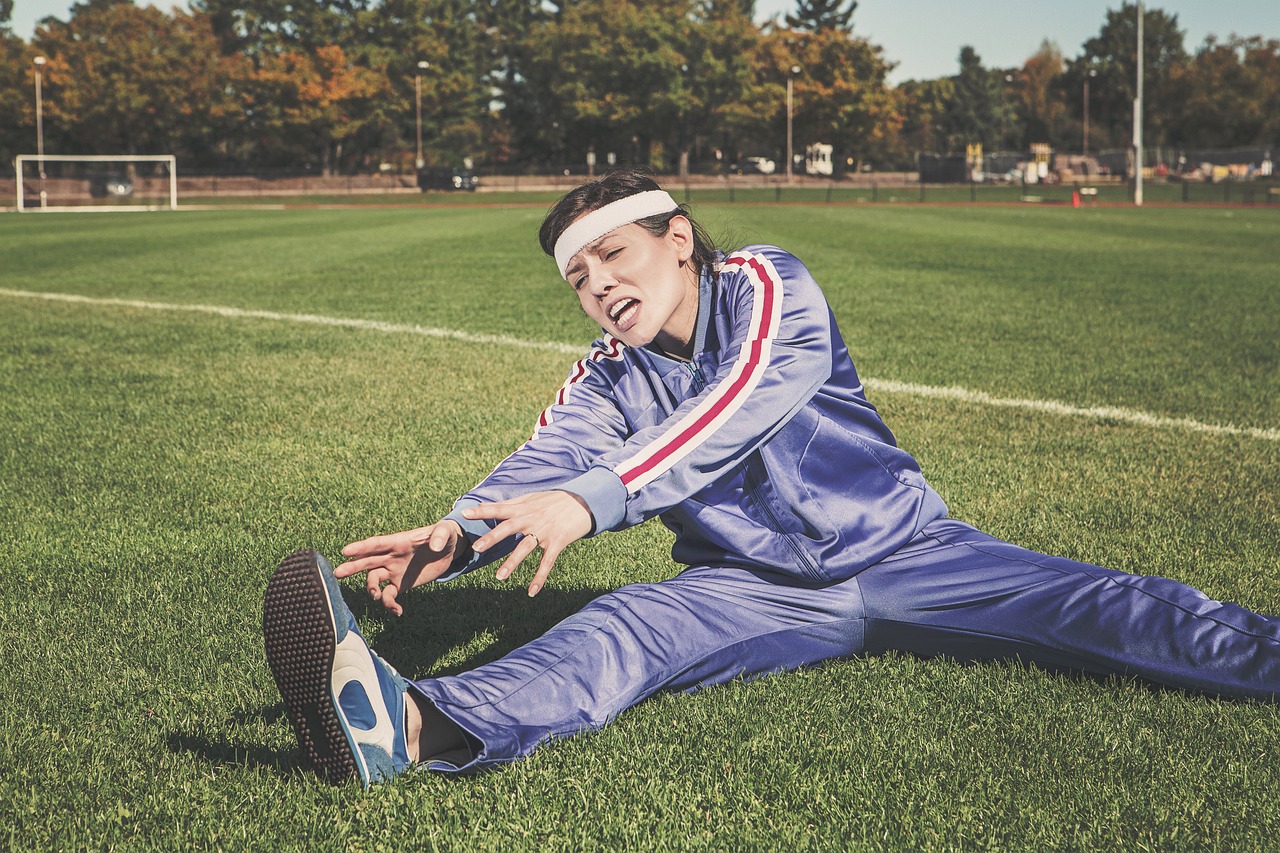 stretching, nature, sports, woman, athlete, fitness, sport, healthy, exercise, workout, young, female, body, lifestyle, training, fit, health, stretch, people, active, girl, adult, person, sportswear, athletic, gym, exercising, physical, sporty, white, pilates, leisure, tracksuit, track and field, shoes, headband, grass, field